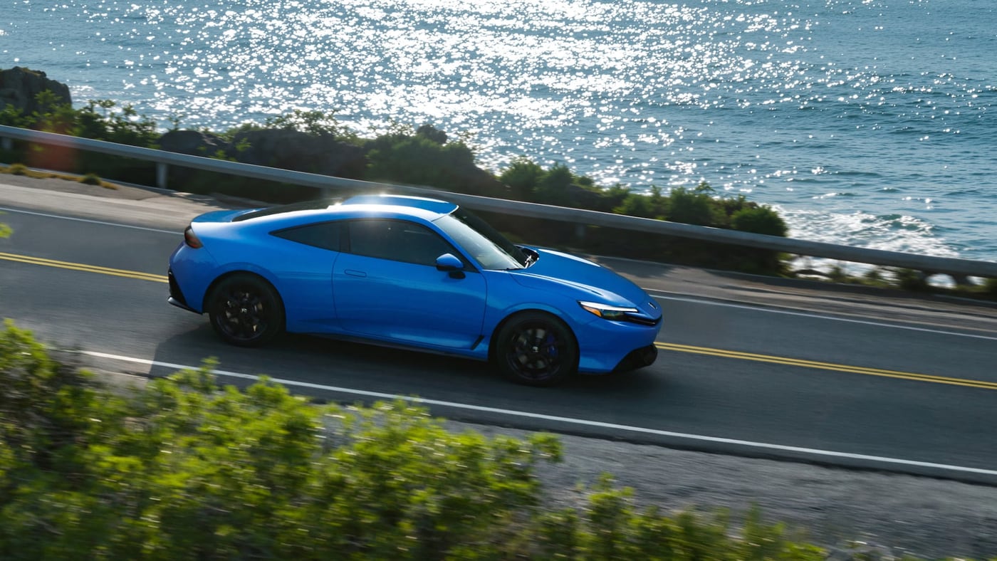 2026 Honda Prelude driving on a coastal road