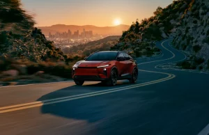 2026 Toyota C-HR electric SUV driving on a mountain road