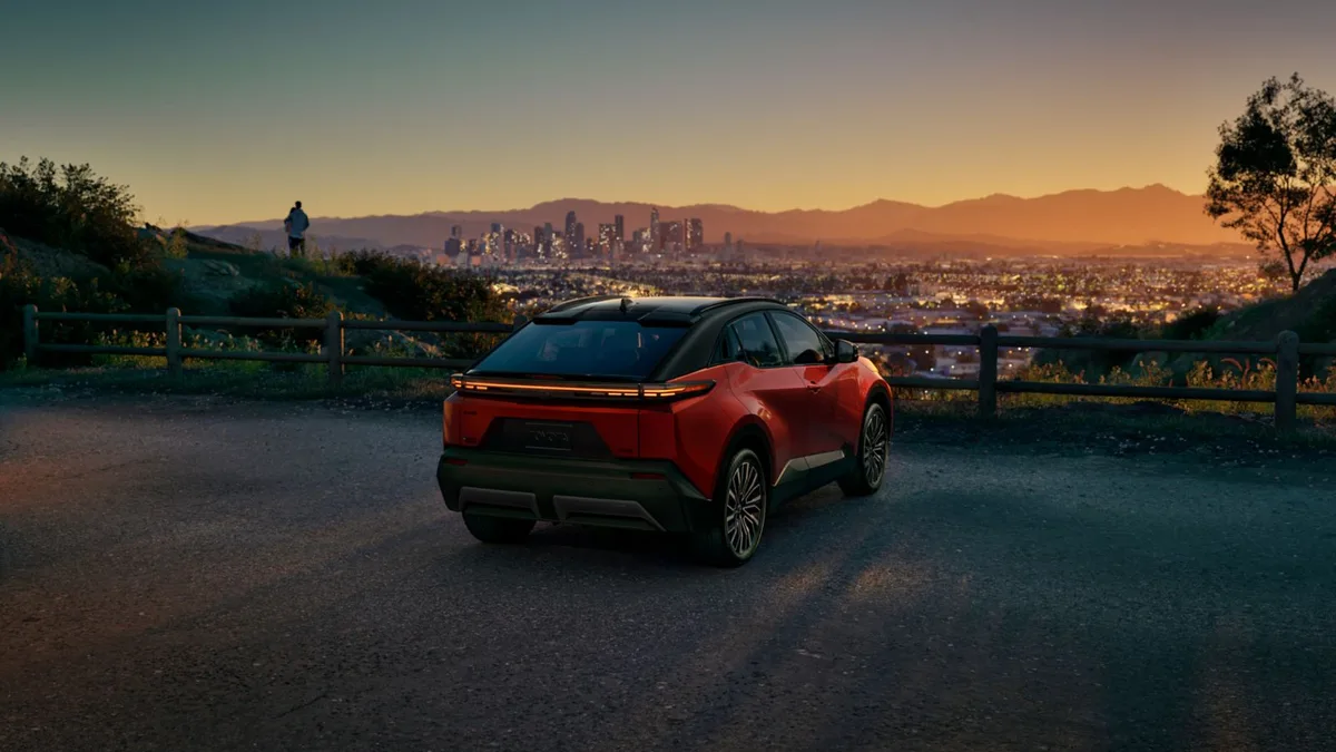 2026 Toyota C-HR electric SUV driving on a mountain road