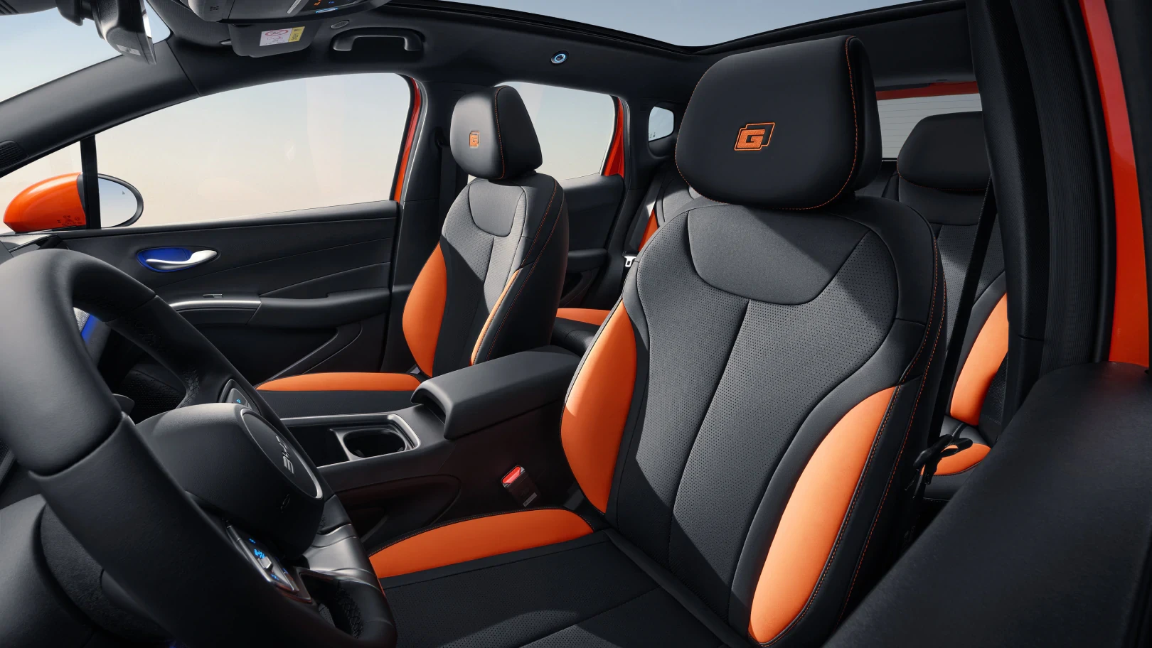 BYD Dolphin G DM-i interior with orange trim