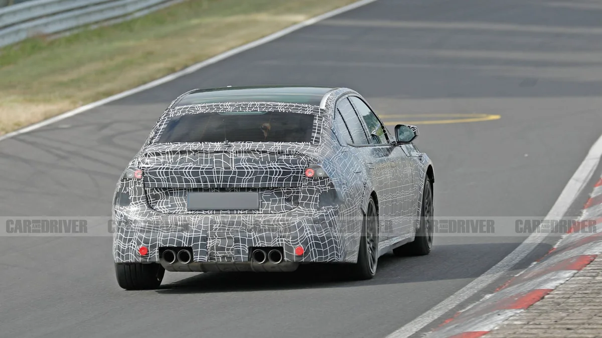 Camouflaged next-generation BMW M3 prototype testing on track