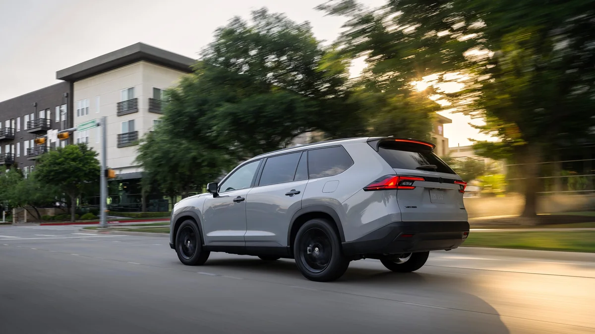 2026 Toyota Grand Highlander shown from the rear three-quarter angle