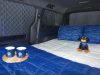 2027 Volkswagen ID. Buzz Tourer: Camper Charm, Charging Reality 2027 Volkswagen ID Buzz Tourer camping bed setup